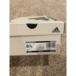 White Adidas running shoes